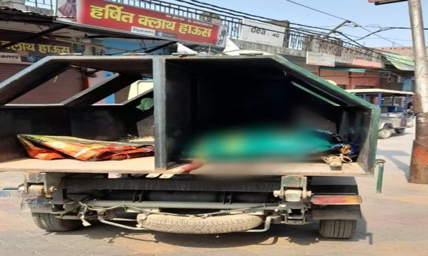 Womans dead body in garbage vehicle