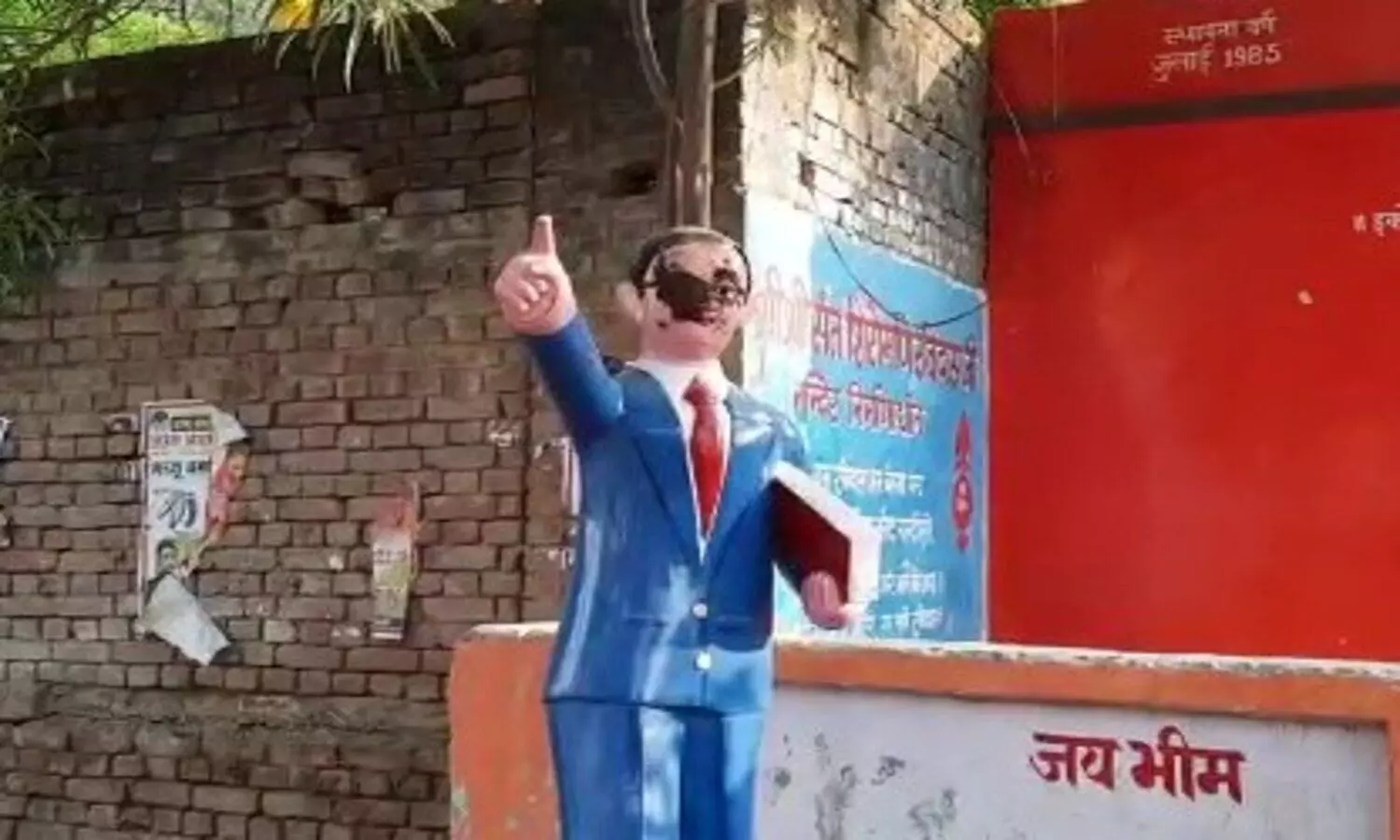 On Dr.Bhimrao Ambedkar statue throw cowdunk