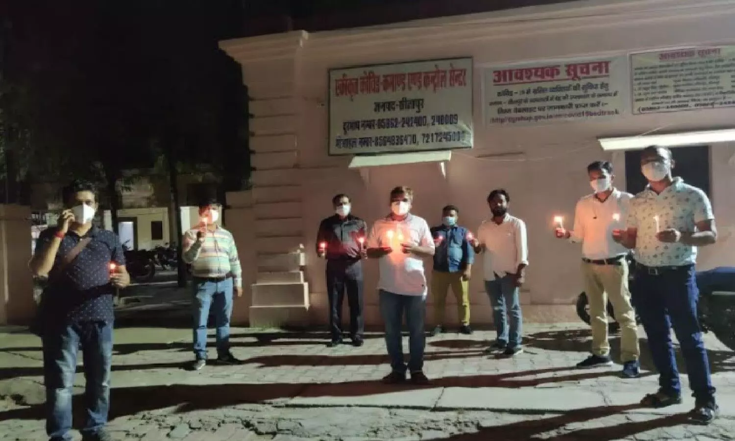 NHM Union paid tribute to the martyrs who had died while doing corona duty by burning candles