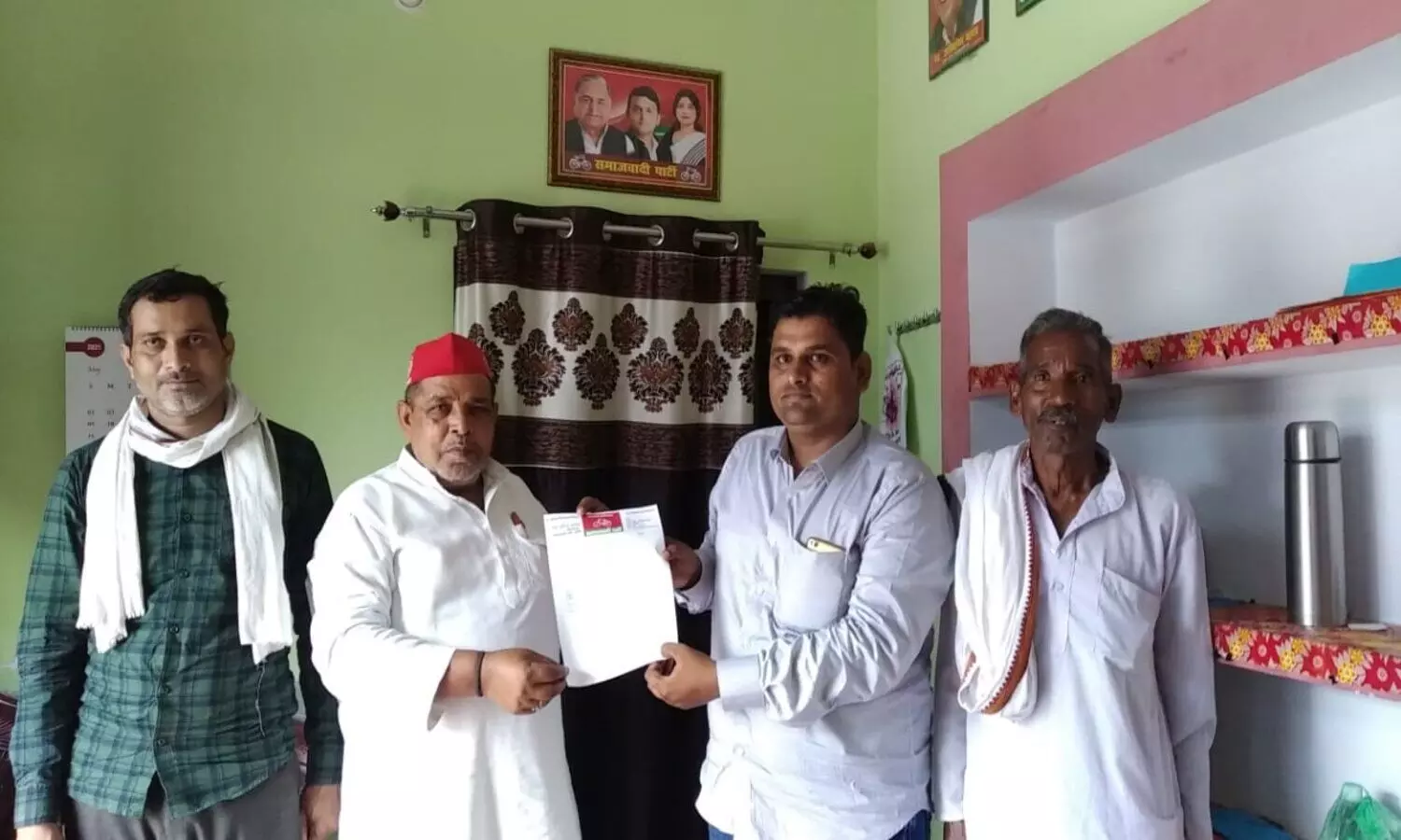 District President Ram Udit Yadav giving the nomination letter
