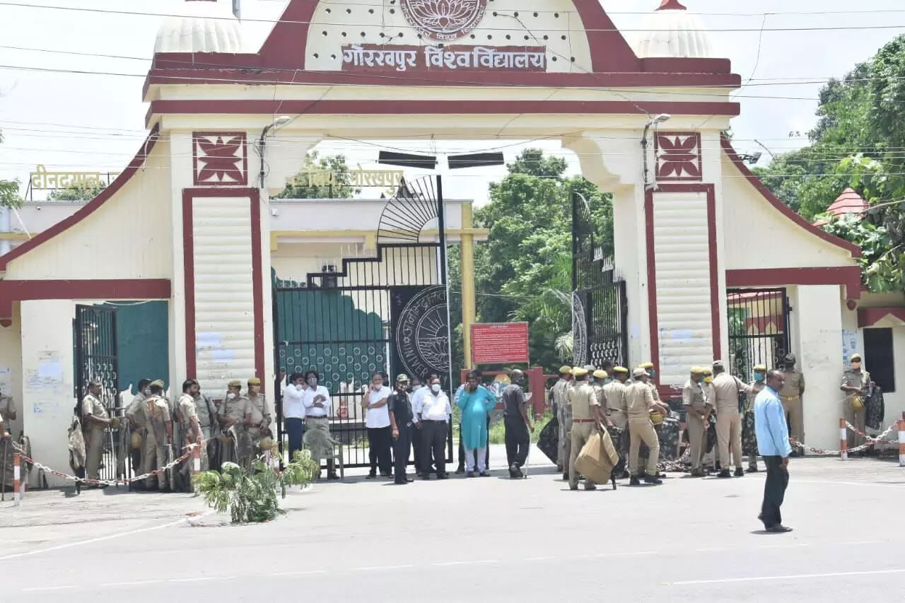 Police at main gate after suspicious death of home science student in Gorakhpur