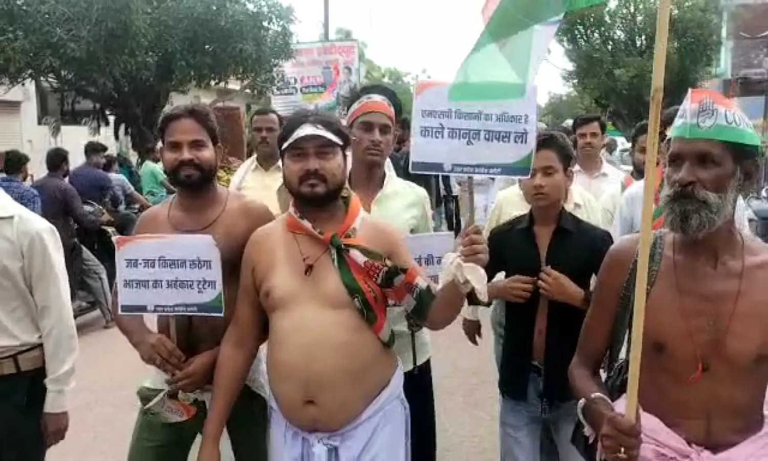 Congress leader protesting with half naked body