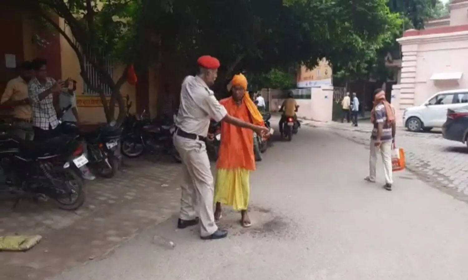 Police stopping to old man for not burning ourselves