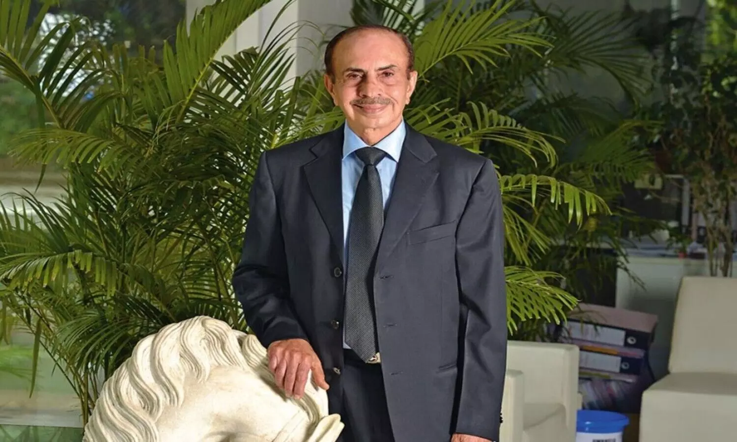 chairman adi godrej resigns from his position