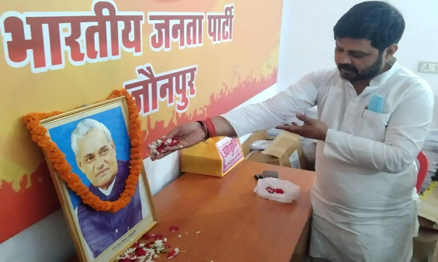 Floral tribute on the Photo of Atal Bihari Vajpayee