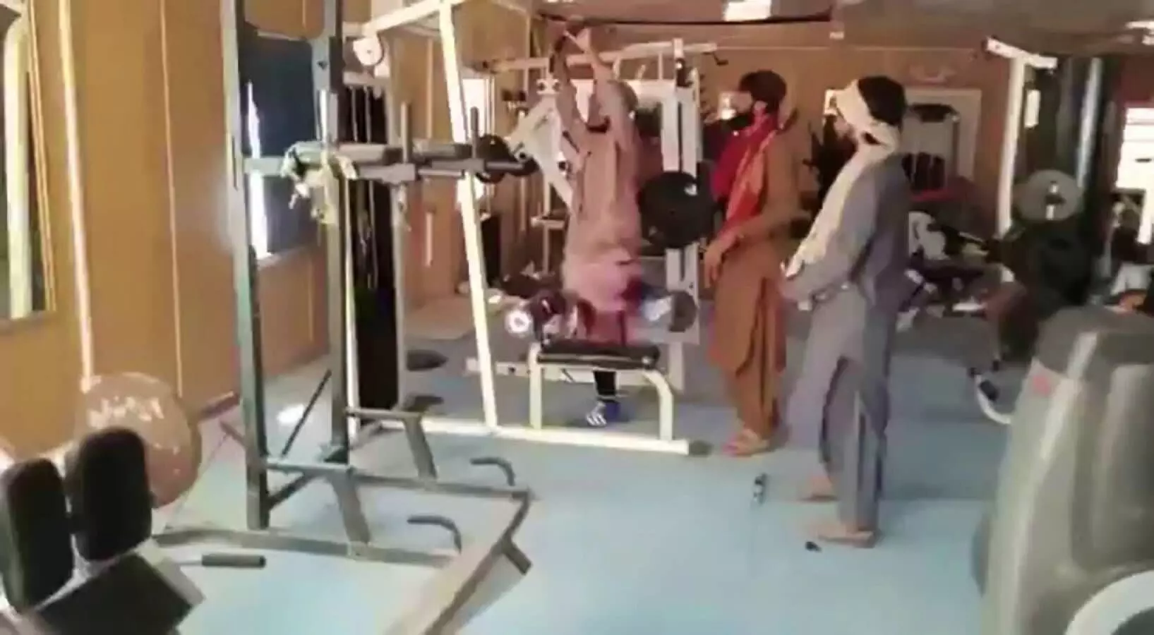 Taliban fighters seen having fun in children
