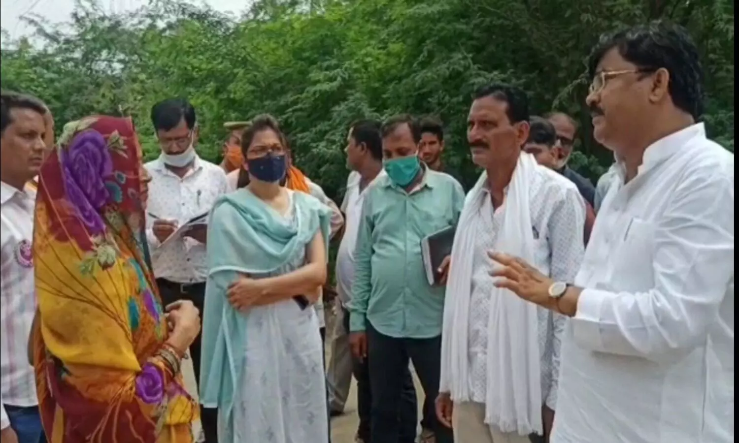 Minister of state jay kumar jackey interacting with villagers