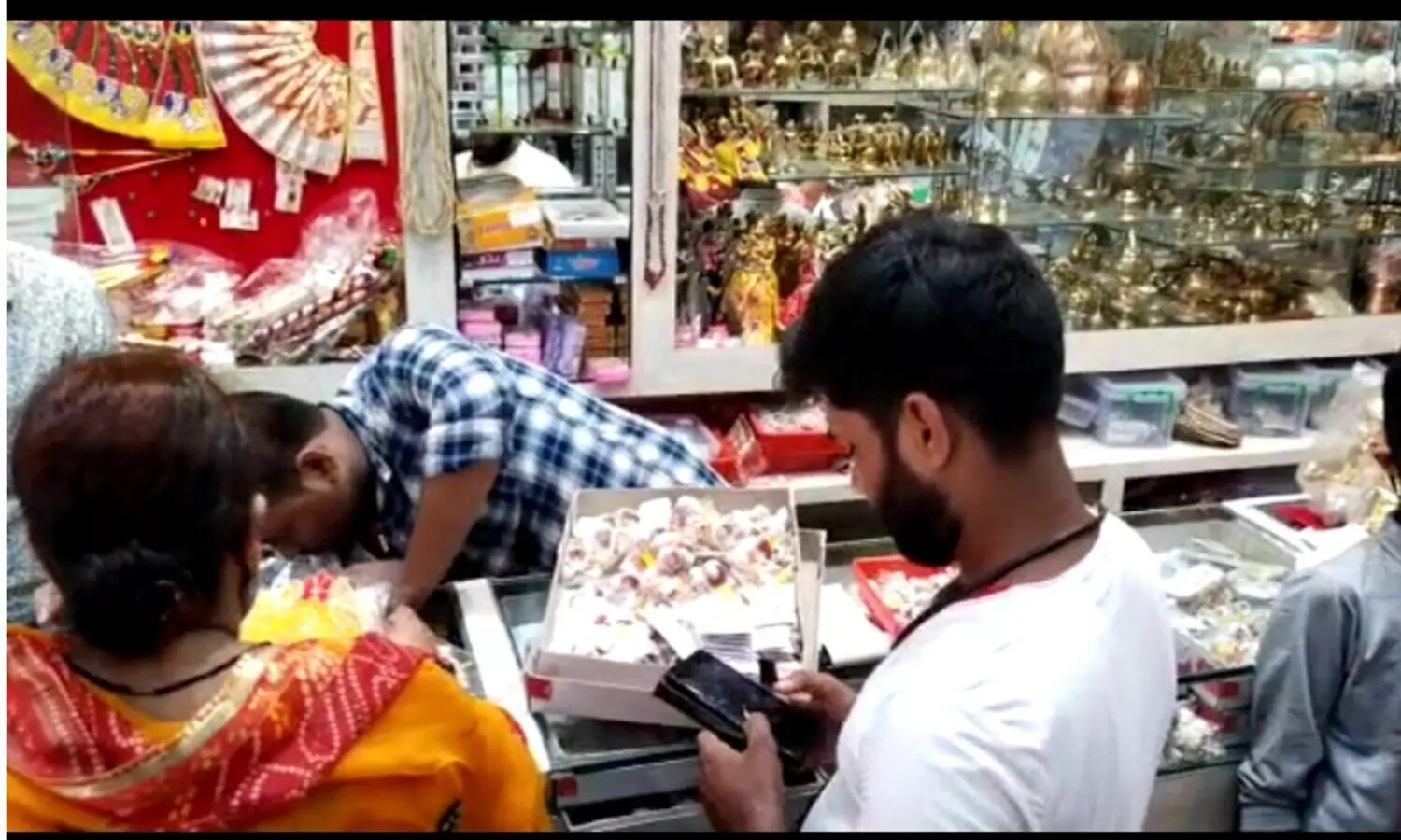 People buying products for janmasthmi puja