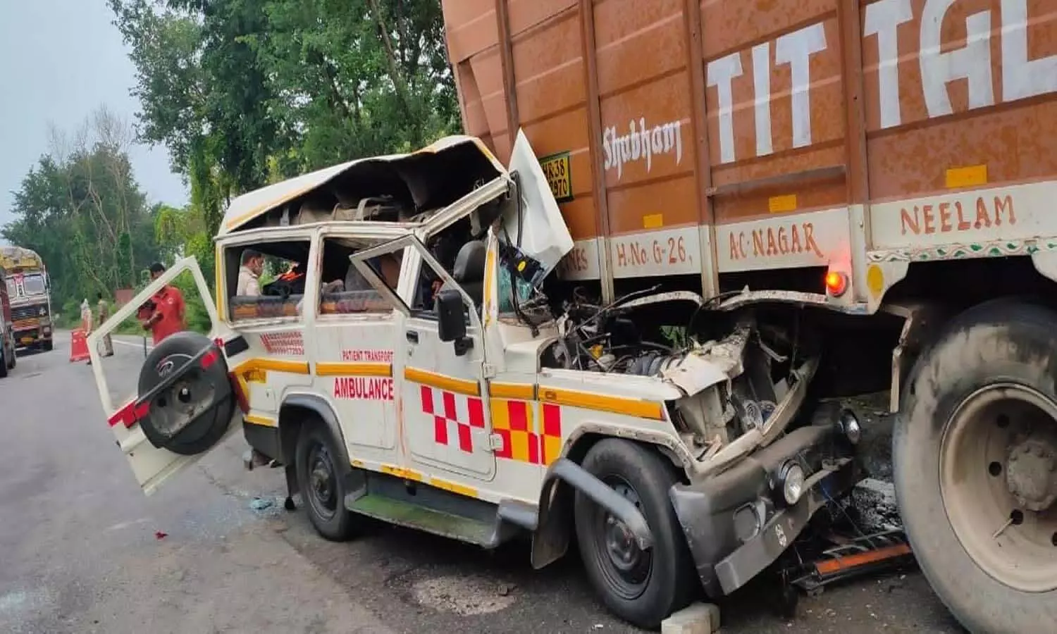 Ambulance carrying dead body enters parked container, 2 killed, 3 injured
