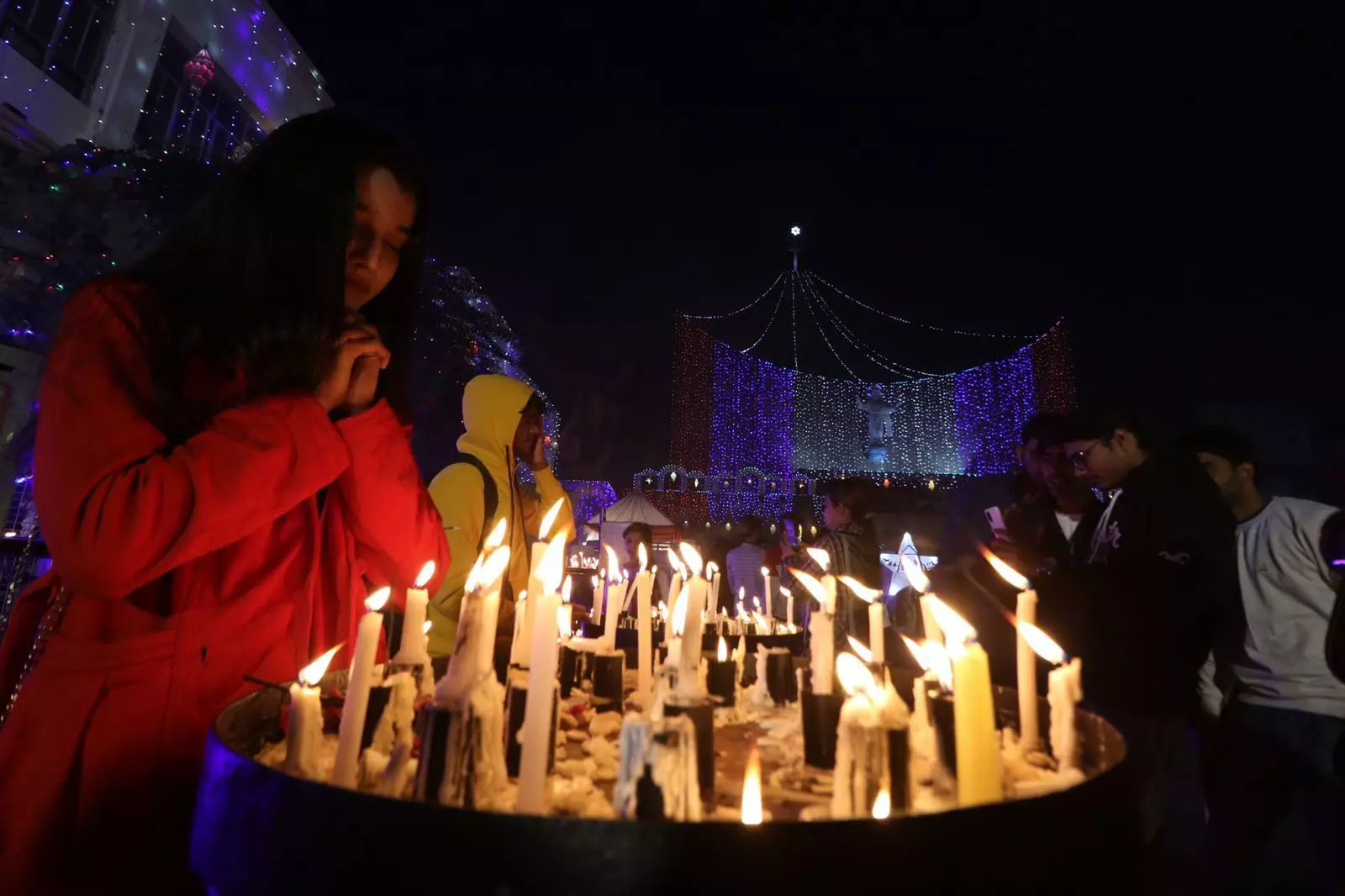 Christmas Day: People praying by lighting candles at Cathedral Church on Christmas Eve, see photos
