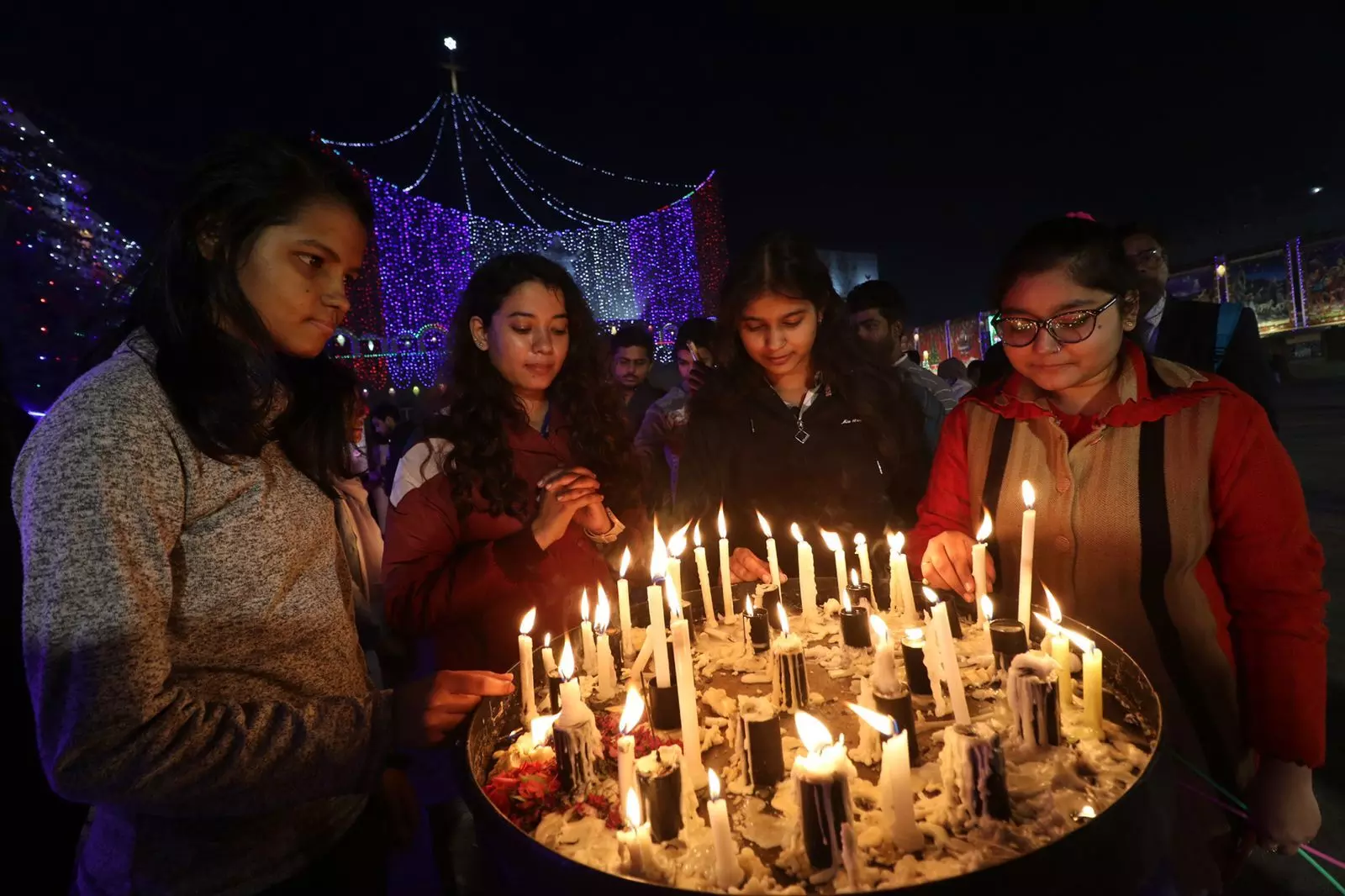 Christmas Day: People praying by lighting candles at Cathedral Church on Christmas Eve, see photos