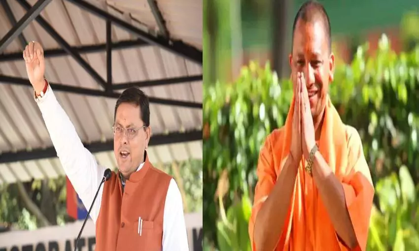 CM Yogi Adityanath and CM Pushkar Singh Dhami