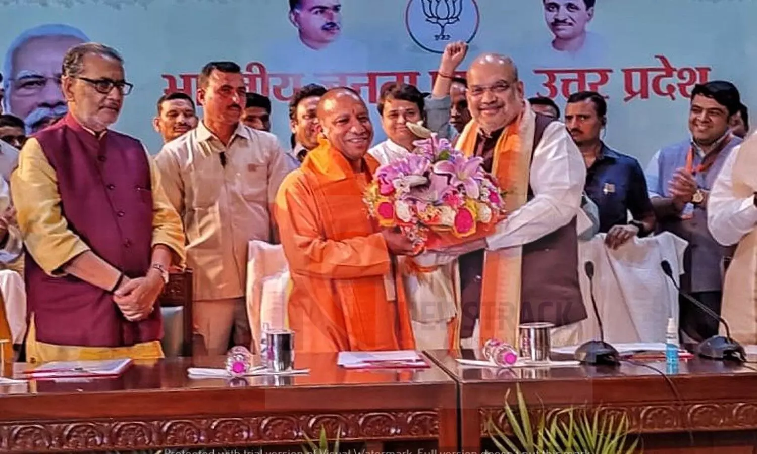 Amit Shah congratulating Chief Minister Yogi Adityanath