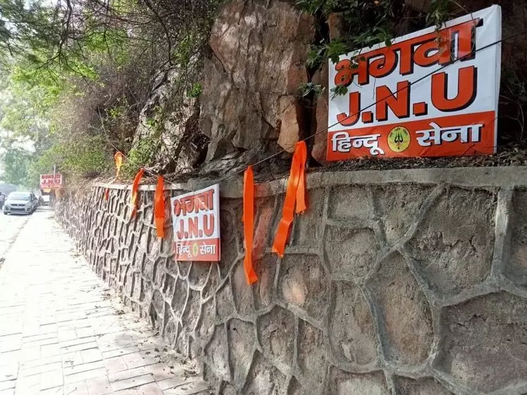 jnu violence hindu sena put up saffron flags at campus gate wrote saffron jnu on poster