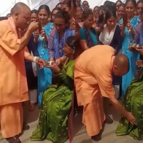 up cm yogi adityanath eating curd from his mother hand before left panchur village uttarakhand