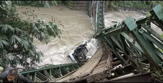 due to heavy rain roads and bridges collapsed in manipur