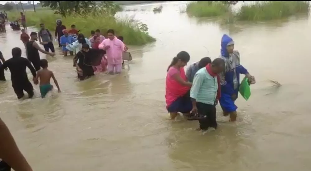 due to heavy rain in the water acquisition area of nepal flood situation in bihar