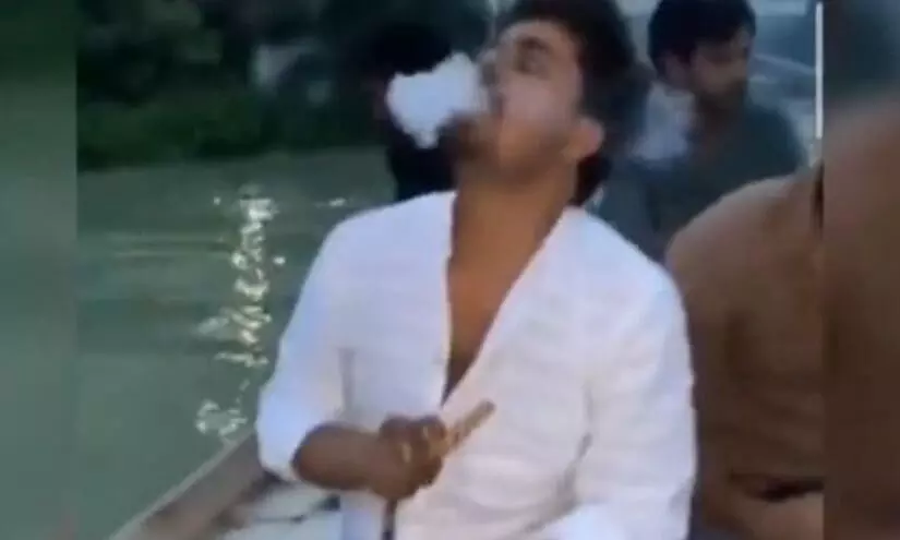 prayagraj viral video mutton chicken hookah party on a boat in ganga river near dashashwamedh ghat
