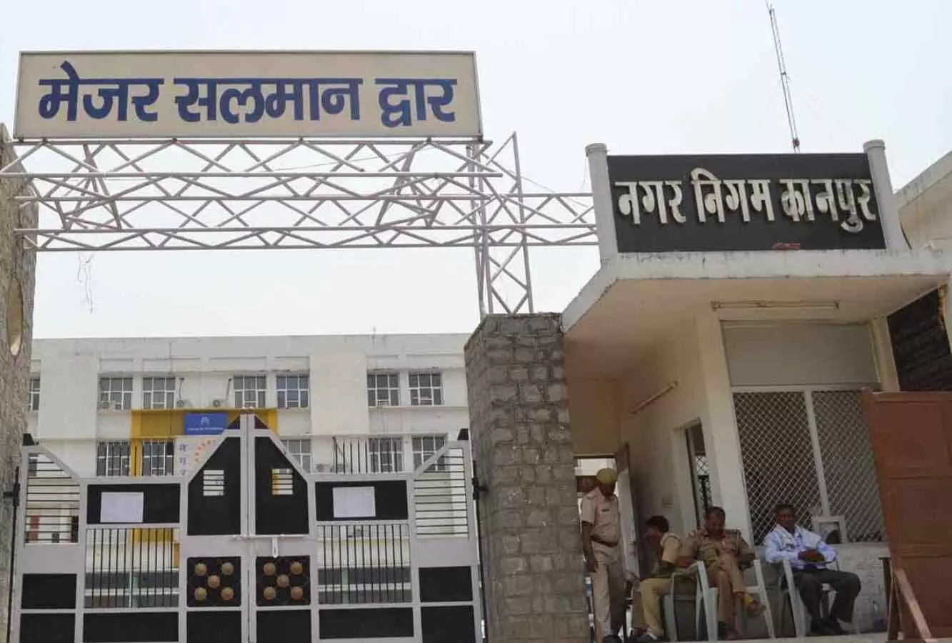 kanpur municipal corporation employee accused spitting food water action uproar accused removed