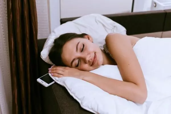 Is it safe to sleep with a phone near the pillow