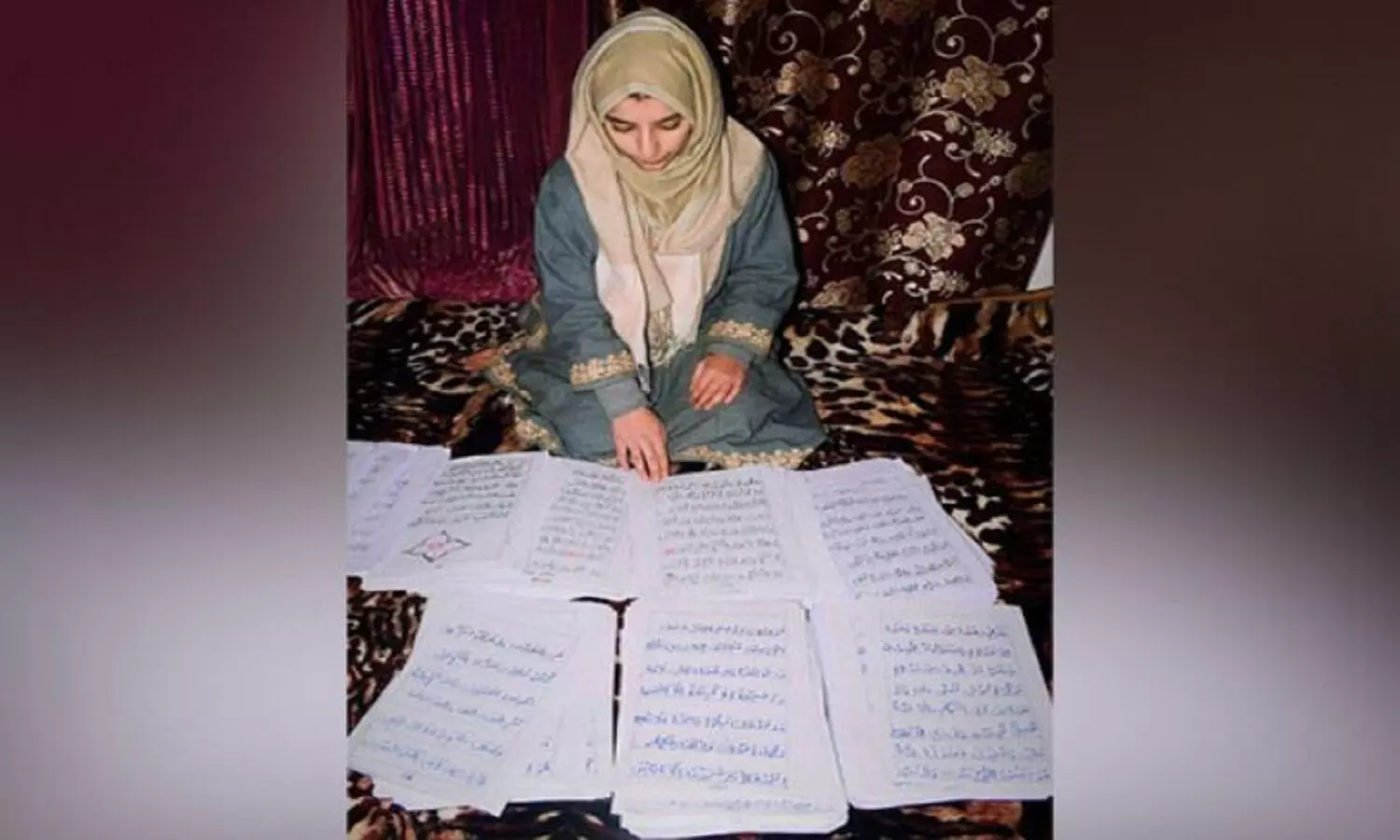 student writes 900 page Quran with hands