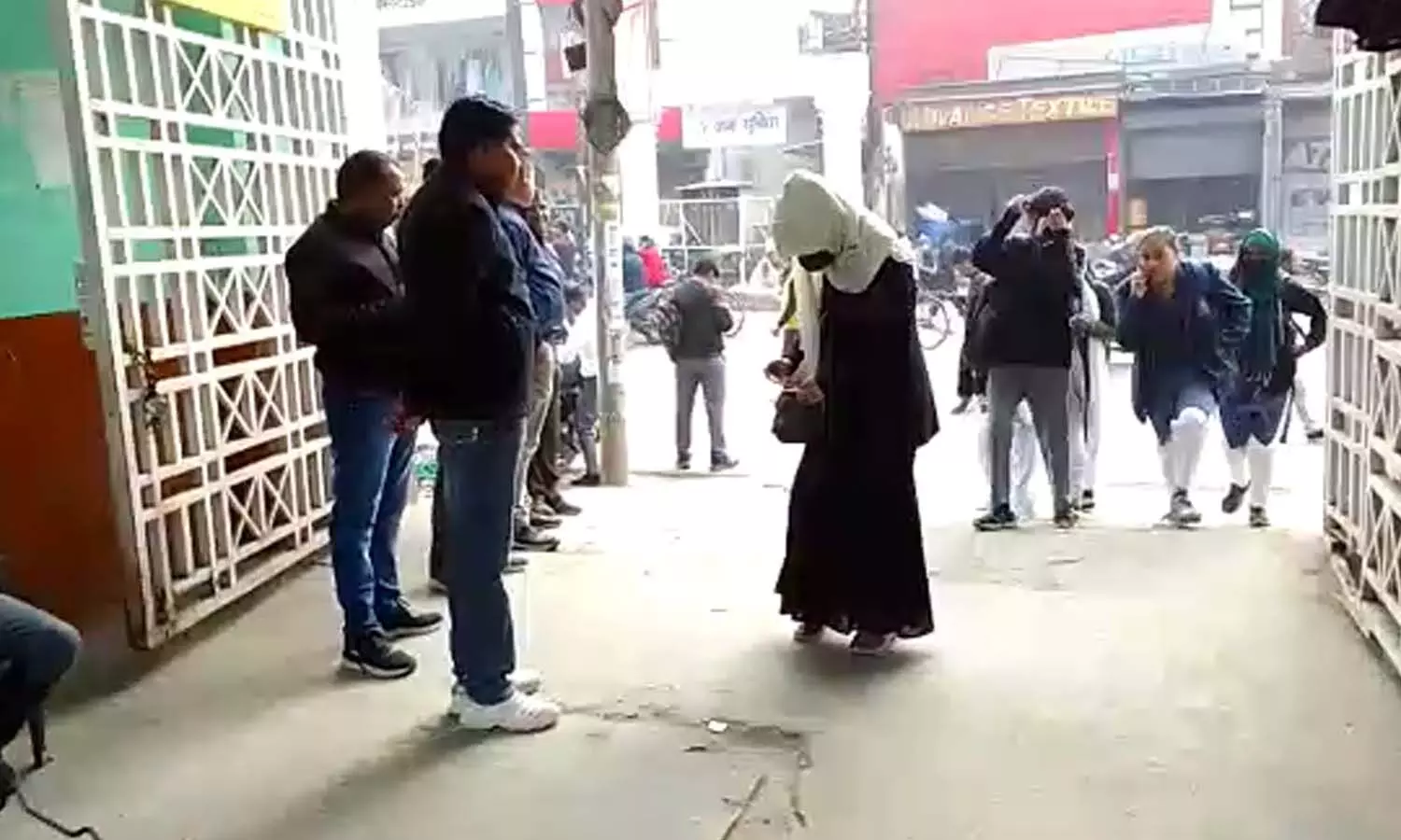 Burqa being removed from students at the gate of Hindu PG College, Moradabad, was banned from January 1