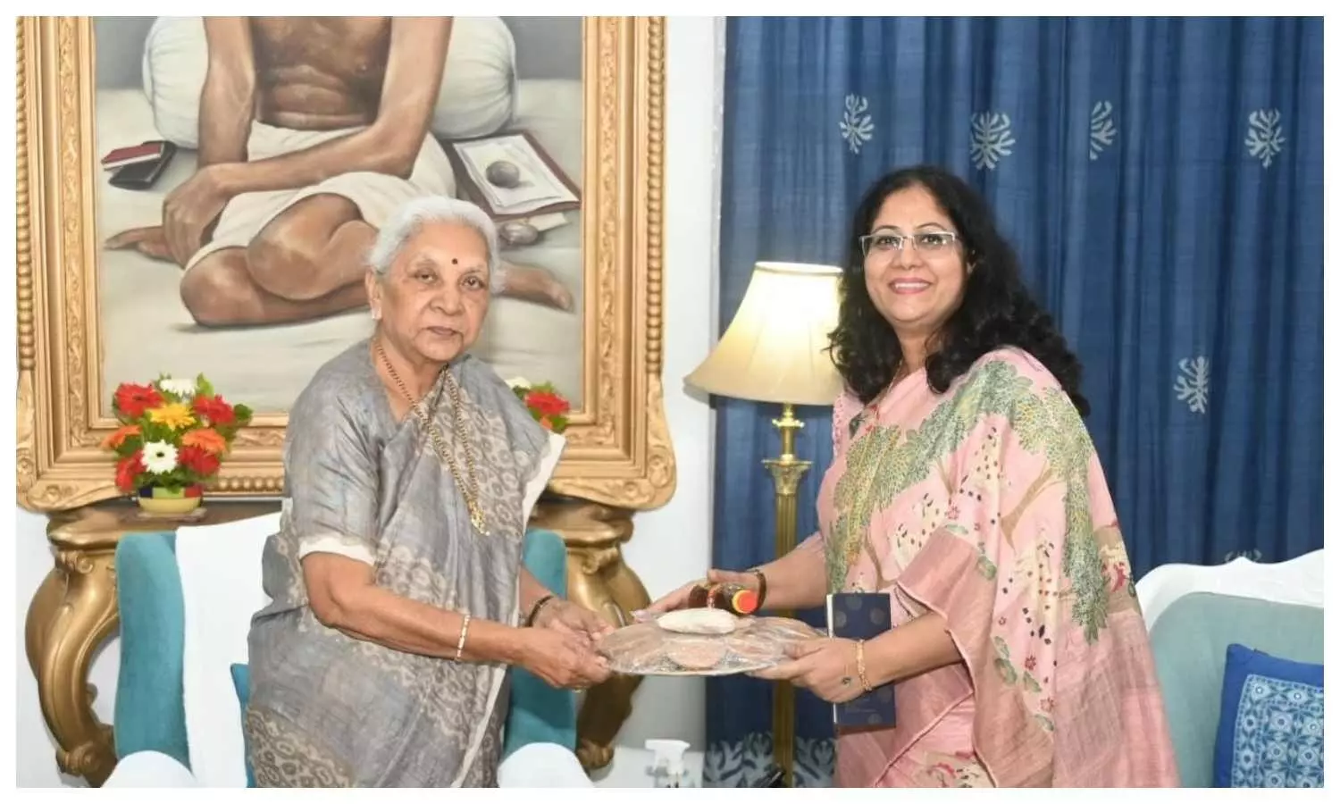 Governor Anandiben Patel handed over material for lighting