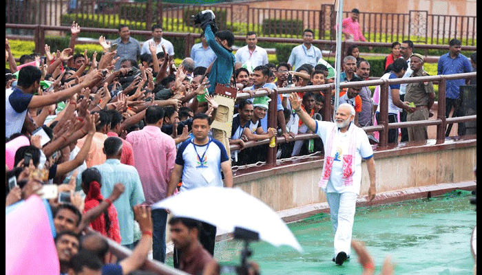 pm modi yoga poses on international yoga day in lucknow