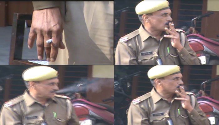PHOTOS: चुनावी ड्यूटी के समय सिगरेट के कश लगाते नजर आए दरोगा साहब