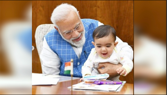 PM Modi ने नन्हे दोस्त के साथ शेयर की तस्वीर, यहाँ जाने कौन है ये बच्चा !