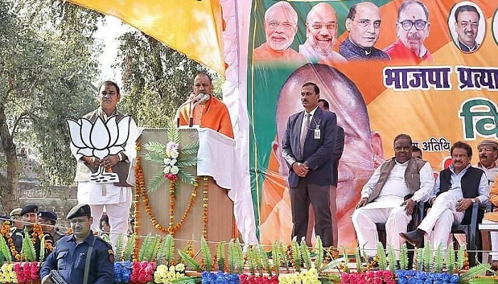BJP MLA Ajit Pal with Yogi Adityanath